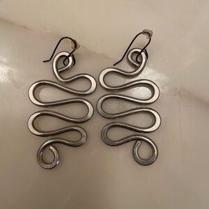 Funky silver tone dangle earrings